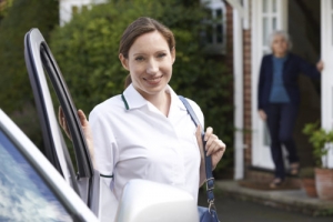 caergiver waiting her patient in the driveway